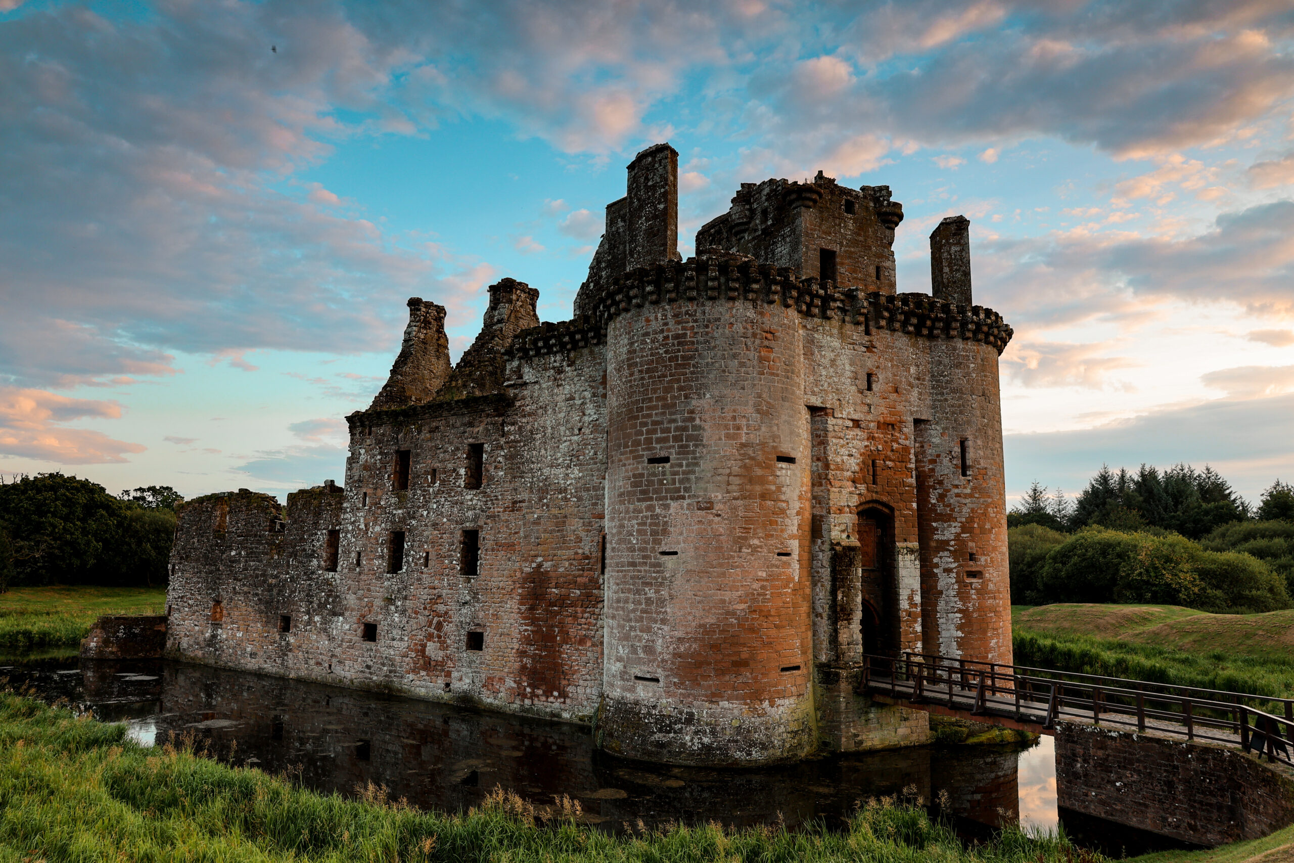 Sunset over Caerlaverloch Castle in Dumfries and Galloway, Scotland