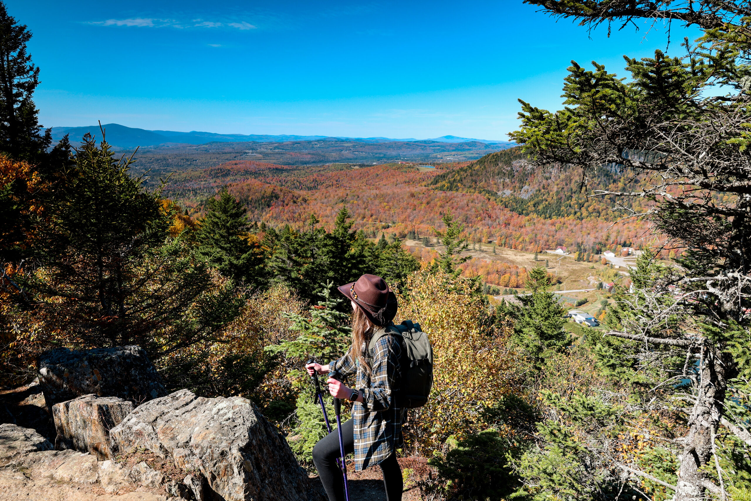 women looking at the fall colours over Dixville Notch
